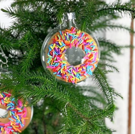 I am in love with all things sprinkles. I literally have purchased things simply because they are covered in sprinkles. My crafty fun book for the holidays that I wrote and illustrated is titled Sprinkling Holiday Kindness. So, making this Diy Sprinkle Donut Ornament was the most fun I have had in a long time. Because Beacon Gem-Tac is so amazing, the ornament came together so much easier than I had anticipated. I can Creative Diy Ornaments, Candyland Ornaments Diy, Candyland Ornaments, Candy Themed Christmas Decor, Donut Christmas Tree, Donut Ornament, Candy Trees, Diy Sprinkles, Fake Cakes