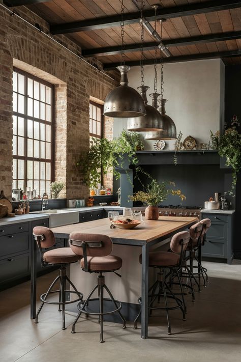 Rustic kitchen with brick walls, large windows, wood and metal island, industrial pendant lights, and greenery accents. Industrial Kitchen Living Room, Kitchen Design Industrial Style, Wood And Dark Kitchen, Industrial Style Kitchen Ideas, Dark Industrial Aesthetic, Industrial Office Kitchen, Industrial Kitchen Interior, Industrial Rustic Kitchen, Brick Kitchen Island