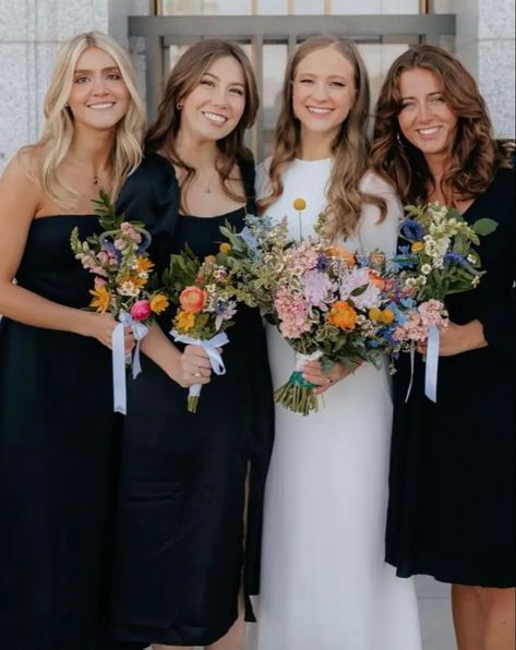 Black Bridesmaid Dress Wildflowers, Black Bridesmaid Dresses With Colorful Shoes, Black Bridesmaid Dresses Colorful Shoes, Black Bridesmaid Colorful Flowers, Black Bridesmaid Dresses With Bright Bouquets, Black Bridesmaids Dresses Summer, Black Bridesmaid Dresses With Wildflowers, Flowers With Black Bridesmaid Dresses, Spring Wedding Black Bridesmaid Dress