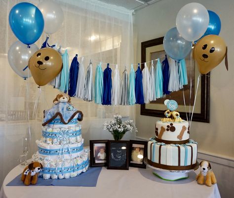 Puppy theme baby shower for boy Puppy diaper cake and puppy main cake Puppy balloons Golden Retriever Baby Shower Theme, Baby Shower Puppy Theme, Dog Themed Baby Shower Ideas, Puppy Balloons, Puppy Baby Shower Theme, Dog Baby Shower Theme, Cake Puppy, Puppy Baby Shower, Themed Baby Shower Ideas