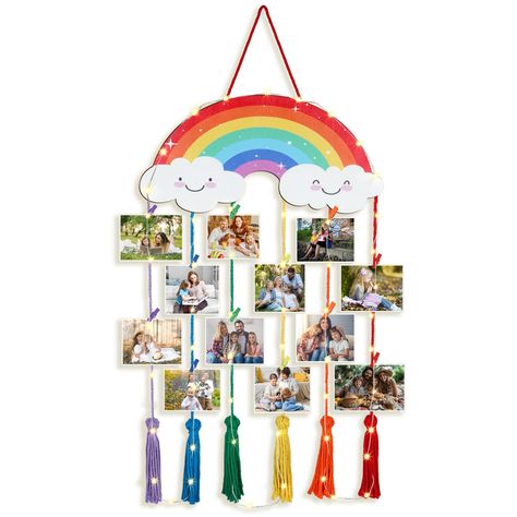 PRICES MAY VARY. Rainbow Hanging Photo Display: you will get a rainbow photo hanging display equipped with 5 tassel rope and 30 clips which can hang multiple photos to meet the needs of multi pictures display; With 2 LED light strings, the display is more romantic and heartwarming Wooden Material: the rainbow photo hanging display is mainly made of quality wood, with fine workmanship and clear printing, nice and reusable, making it convenient to hang on the wall and keep for a long time Easy to Picture Collage Board, Boho Picture Frame, Family Wall Collage, Kindergarten Decoration, Hanging Photo Display, Room Decor Hanging, Rainbow Hanging, Kindergarten Decorations, Photo Hanging