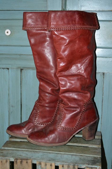 OWWW OWWWWWWWW! Red hot knee high (or over the knee boots if you do not fold the cuffs over) russet brown vintage boots from Zodiac in a VERY RARE size 12. These boots are all genuine leather and are in GREAT vintage condition! Just gorgeous with awesome whipstitch detailing and stacked wood heels. AMAZING! Soft and supple, yet substantial real leather throughout. Soles have been replaced and rubberized for extra longevity...not to mention- comfort! NO STICKY LINERS! In fact, these are fully int