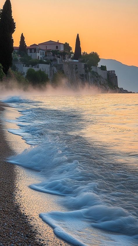 "Serene Dawn at Mount Athos: Captivating Aegean Sea Views"Experience the peaceful beauty of Mount Athos at dawn, where soft waves meet the Aegean Sea under a misty sky. Perfect for those seeking tranquility and inspiration! #MountAthos #AegeanBeauty #DawnDreams #OrthodoxLogos Mount Athos, Aegean Sea, Soft Waves, Greek Gods, Tahiti, Beauty, Quick Saves