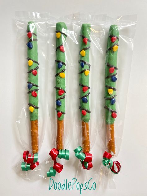 Cute little pretzel rods made just for you! Includes one dozen (12) Christmas light pretzel rods. They will be individually wrapped with cello bags & tied with matching ribbon. There are holiday Oreo cookie pops available at my shop also. Please give the date that you will need your order. They will be made & shipped closer to your party date. They should be shipped at a location where someone will be there to receive them so they aren't out in the heat/sun. Insulated wrap & ice pack Pumpkin Pretzel Rods, Christmas Chocolate Pretzel Rods, Fortnite Pretzel Rods, Christmas Themed Chocolate Covered Pretzels, Holiday Pretzel Rods, Grinch Pretzel Rods, Gourmet Pretzel Rods, Pretzel Rods Dipped Christmas, Dipped Pretzel Rods Christmas