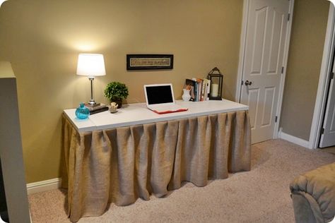 idea for draping under my office desk/countertop to hide all the storage...hang with Velcro underneath? Diy Table Skirts, Desk Skirt, Build A Desk, Desk Redo, Jones Design Company, Dorm Diy, Office Guest Room, Table Skirt, Built In Desk