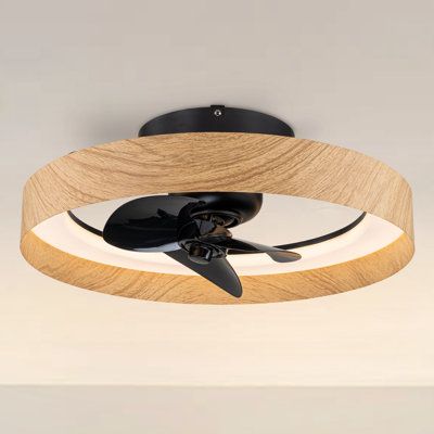 This fan follows the current trend of combining the advantages of a fan with a ceiling light, with a DC motor, ideal for rooms from 30 to 50 square feet. With a black metal body and three ABS blades in the same colour, comes with a light wood-coloured ABS shade, the fan fits any style room. 360-degree addressable airflow, high-quality DC motor for high performance with minimal power consumption and sound. Summer/winter function included. Comes with a 32W, 2560 lumen LED light source that is cont Masculine Ceiling Light, Flush Mounted Ceiling Fan, Ceiling Fan Chandelier Living Room, Low Profile Fan With Light, Fan Over Dining Table, Home Office Ceiling Light, Modern Bedroom Lighting Ceiling, Ceiling Fan Kitchen, Small Ceiling Fan With Light