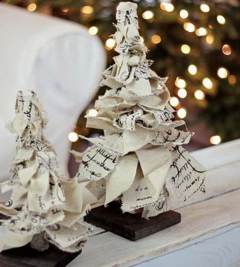 Rag Ribbon Tabletop Christmas Trees | These DIY mini trees are perfectly rustic. Ribbon Christmas Tree Diy, Tabletop Christmas Trees, Ribbon Christmas Tree, Christmas Tree Diy, Fabric Christmas Trees, Alternative Christmas, Alternative Christmas Tree, Real Christmas Tree, Ribbon Christmas