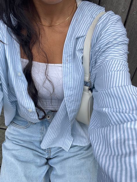 White Shirt And Light Blue Jeans Outfit, Tops For Light Blue Jeans, Blue And White Chemise Outfit, Light Blue Old Money Aesthetic, Blue Shirt Inspo Outfit, Blue Jeans Blue Shirt Outfit, White And Blue Blouse Outfit, Light Blue Jeans Summer Outfit, Striped Cropped Shirt Outfit