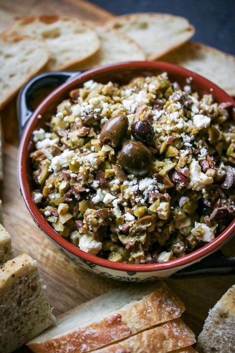 This chunky olive tapenade is flavored with lemon-infused olive oil and tangy feta- a memorable party appetizer! Olive Tapenade Recipe, Tapenade Olive, Olive Dip, Tapenade Recipe, Olive Tapenade, Wine Food Pairing, Party Appetizer, Tapenade, Appetizer Dips