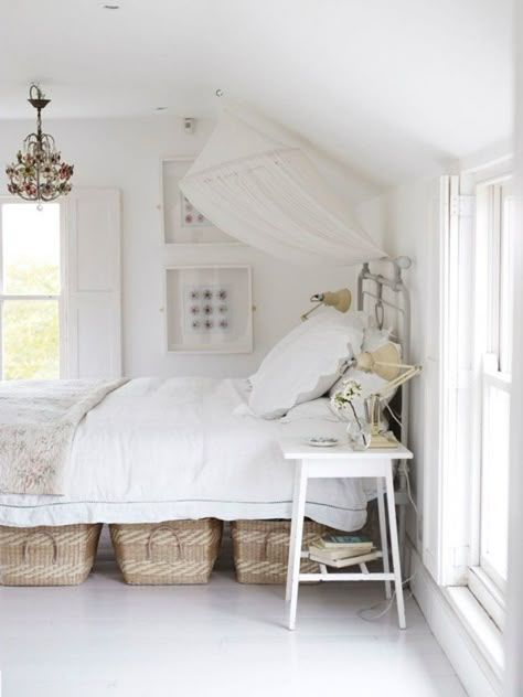 Baskets under the bed are a great place to stash extra stuff — and unlike the traditional under bed boxes, they're nice enough to look at all the time. Under Bed Basket, Foster House, Case In Stile Country, White Bed, Dreamy Bedrooms, Tiny Bedroom, Under Bed, Under Bed Storage, White Bedroom