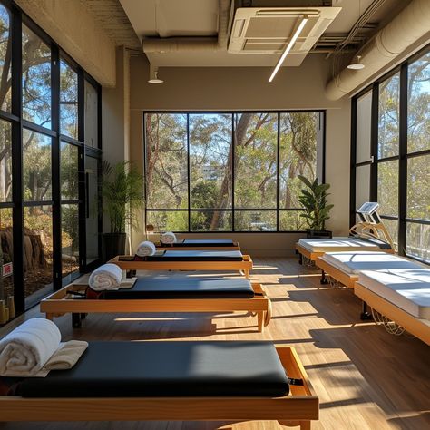 Serene Pilates Studio: A tranquil Pilates studio bathed in sunlight with modern equipment and a view of nature. #pilates #studio #serene #tranquil #sunlight #equipment #reformer #modern #aiart #aiphoto #stockcake https://ayr.app/l/VWQy Pilates Retreat, Best Pilates Studio Design, Reformer Pilates Studio Design Interiors, Outdoor Pilates Studio, Reformer Pilates Home Studio Design, Pilates Reformer Studio, Aerial Yoga Studio Design, Pilates Yoga Studio, Eco Garden