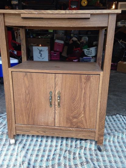 painted furniture microwave cart makeover, painted furniture, repurposing upcycling, Before Microwave Cart Makeover, Microwave Carts, Countertop Transformations, Faux Brick Backsplash, Diy File Cabinet, Microwave Cart, Microwave Cabinet, Faux Brick Panels, Black Cherry Wood