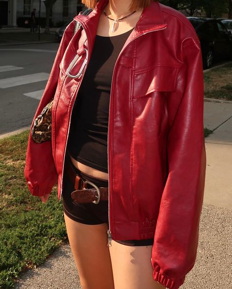 red jacket, bold attitude 🚨 @aelfricedenofficial #streetgirl #fallinspo #fallfashion #fallvibes #falloutfits #pinterestoutfit #chicoutfit #aesthetics #fashionstyle red leather jacket, black mini shorts, short hair, cowboy boots, leopard print, leopard handbag, fall jacket, fall boots, fall outfit ideas, cheetah print bag, vintage belt, thrift finds Black Mini Shorts, Red Jacket Outfit, Cheetah Print Bag, Boots Fall Outfit, Boots Leopard, Leopard Handbag, Dream Fashion, Fall Boots, Red Leopard