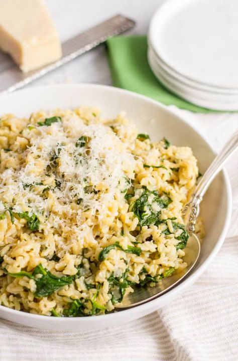 Brown rice with spinach and Parmesan cheese - Family Food on the Table Brown Rice Side Dish, Brown Rice Dishes, Rice With Spinach, Rice Recipes Side, Parmesan Rice, Healthy Rice Recipes, Recipes With Parmesan Cheese, Rice Side Dish Recipes, Arroz Con Gandules