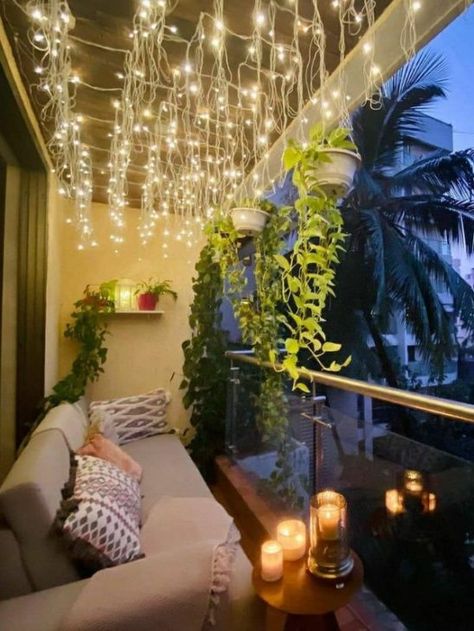 Apartment balconies are a small space with huge potential. Here are a few apartment balcony decor ideas to spruce up your outdoor space. Small Balcony Hanging Lights, Huge Balcony Ideas, Tiny Balcony Design, Unique Apartment Ideas, Private Balcony Ideas, Zen Balcony Ideas, Balcony Lighting Ideas, Zen Balcony, Balcony Lights