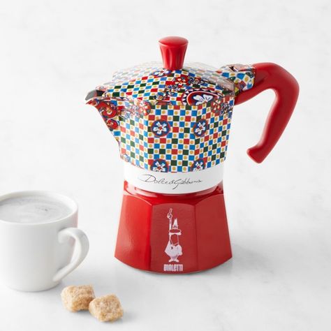 Enjoy the functional artistry of Italian icons Bialetti and Dolce & Gabbana. Originally created in 1933, the revolutionary angular pot becomes an eye-catching statement with vibrant motifs inspired by Sicilian folklore. This Italian-made piece is crafted of durable aluminum with a stay-cool handle and knob. A great gift, the collectible pot helps you make rich, aromatic espresso in just a few minutes. Combines iconic Bialetti silhouette with Dolce & Gabbana design. Handle and knob stay cool on s Bialetti Moka, Italian Traditions, Moka Pot, Italian Coffee, Cooktops, Espresso Maker, Induction Cooktop, Coffee Gifts, Glass Ceramic