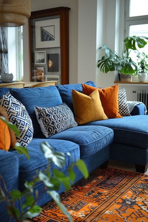 Blue Sofa Living Room Ideas Boho, Navy Blue Couch Aesthetic, Apartment Living Room Blue Couch, Boho Blue Couch, Blue Couch Boho Living Room, Dark Blue Sofa Living Room Decor, Navy Couch Living Room, Blue Boho Living Room, Blue Couch Decor