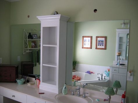 revamp that large bathroom mirror, bathroom ideas, home decor, Added shelving unit and attached to wall just above mirror to help anchor the weight Large Bathroom Mirror, Large Bathroom Mirrors, Large Bathroom, Mirror Bathroom, Small Cabinet, Budget Bathroom, Large Bathrooms, Bathroom Makeover, Shower Tub