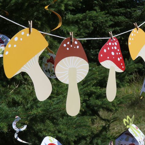 Make your Red Toadstool Party perfect with these shaped party essential decorations. You can easily fill your party space when you use these shaped cut outs for all of your DIY party ideas. Wild Mushrooms decoration party essentials looks great when used as wall decorations, bunting banners, even styled as centerpieces at your tables. Best of all, this set of Wild Mushrooms decoration party essentials will arrive printed with a coordinating pattern on the back so you can hang them from the ceili Diy Mushroom Birthday Party, Mushroom Party Decorations Ideas, Mushroom Props Diy, Mushroom Birthday Decorations, Mushroom Balloon Garland, Mushroom Bulletin Board, Mushroom Party Ideas, Mushroom Bunting, Mushrooms Decoration