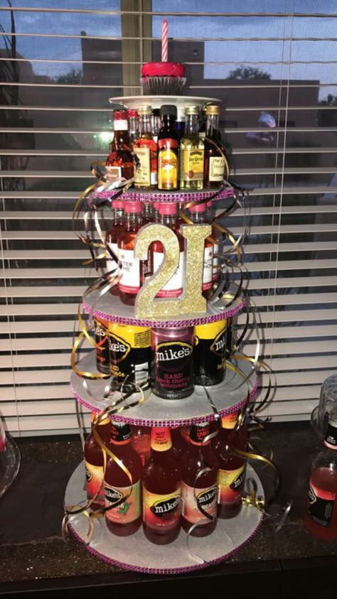 Alcohol tower cake for 21st birthday Alcohol Cake Tower For Guys, 21st Birthday Alcohol Cake Tower, Drink Cake Tower, 21st Birthday Cupcakes For Guys, Alcohol Cake Tower, Alcohol Tower 21st Birthday, Cake For 21st Birthday, Alcohol Tower, 21st Birthday Cake Alcohol