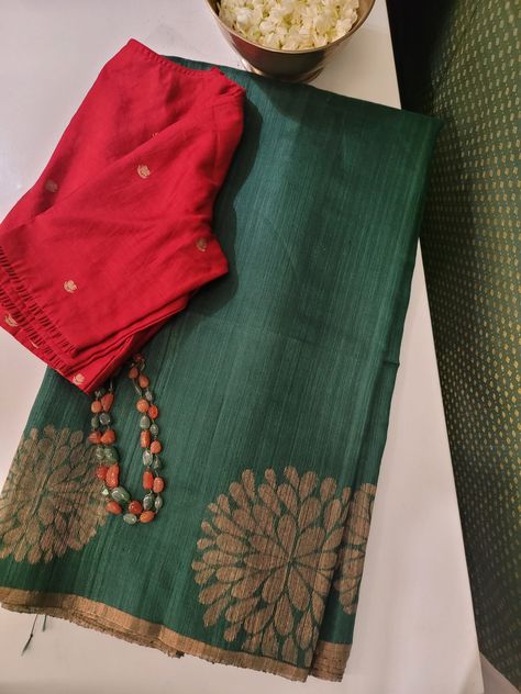 Forest green Matka silk saree with large floral weave above the selvedge through out the body in gold zari. The pallu of the saree is also woven in Forest green with large floral pattern as in the body. Overall, this saree is a stylish and sophisticated choice for a formal occasion and it will be a timeless and elegant addition to any wardrobe. Blouse: Forest green Matka silk self Green Cotton Saree, Sarees Ideas, Geranium Color, Matka Silk Saree, Green Carnation, Blouse Colour, Katan Saree, Saree Wearing, Blouses Designs