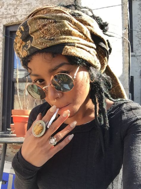 http://tajajanel.tumblr.com/ A Woman, Dreadlocks, Sunglasses, Black