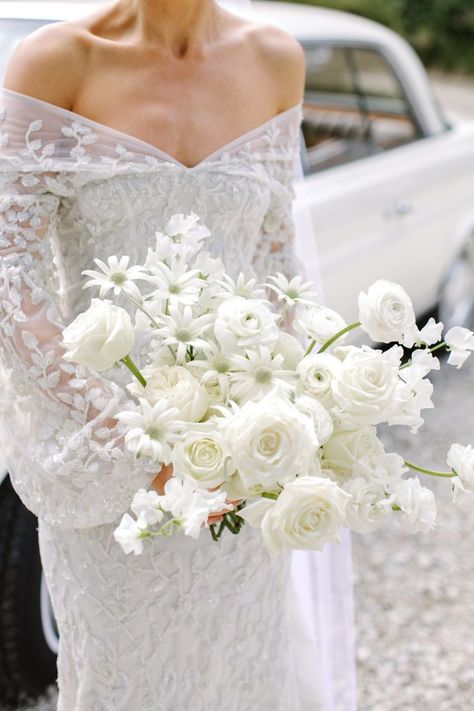 White wedding flowers and theme are always in style, no matter what season you choose to walk down the aisle. Such a pretty source of bridal bouquet inspiration and ideas! #whitewedding #whitebouquet Modern Bridal Bouquets, Highland Wedding, All White Wedding, White Wedding Bouquets, Cheap Wedding Dresses, Wedding Flower Inspiration, White Wedding Flowers, Lace Mermaid, Modern Bridal