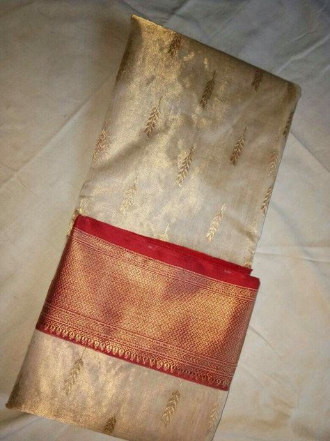 Tissue chanderi silk saree by svaada White Kanchi Pattu Saree, Tissue Kanchipuram Silk Saree, White And Red Saree, Red And White Saree, Kanchipuram Pattu Sarees, White Sarees, Cream Saree, Off White Saree, Engagement Saree