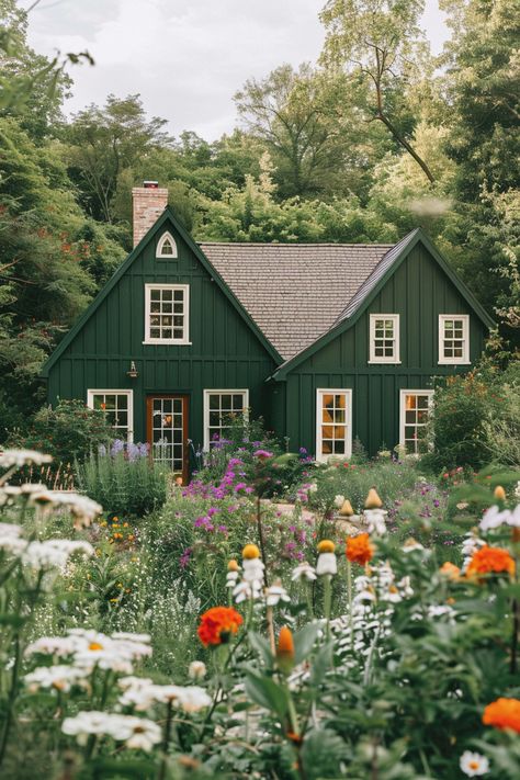 White Brick House Wood Accents, Green Paint Outside House, Painted Cabin Exterior, Paint Colors For Outside Of House, Green And White Exterior House Colors, Woodland Cottage Exterior, Green House Brown Roof, Green House Exterior Ideas, Green Houses Exterior