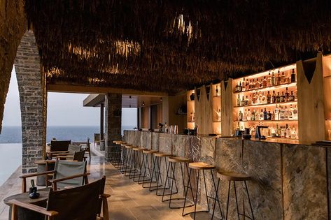 'acro suites' occupies carved-out caves along the coastal cliffs of crete Beach Restaurant Design, Greece Architecture, Restaurant Layout, Bamboo Roof, Seaside Cafe, Circle Bar, A Sense Of Place, Luxury Wellness, Wellness Hotel