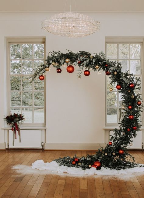 Burgundy Green Christmas Wedding Ideas Charly Mae Photography Crescent Moon Flower Arch Baubles Backdrop #wedding #backdrop At Home Christmas Wedding, Outdoor Christmas Wedding Ideas, Wedding Christmas Wreath, Winter Wedding Background, Unique Christmas Wedding Ideas, Christmas Wedding Diy Ideas, Christmas Flowers Wedding, Christmas Event Backdrop, Christmas Aisle Decorations