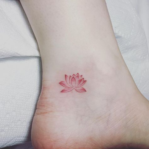 #lotustattoo #ankletattoo #jingstattoo #ink #inked #nytattooartist #detailedtattoowork #femaletattooartist #tatted Red Lotus Tattoo, Simple Lotus Flower Tattoo, Lotusblume Tattoo, Small Lotus Tattoo, Water Lily Tattoos, Lotus Tattoo Design, Flower Wrist Tattoos, Tasteful Tattoos, Red Ink Tattoos