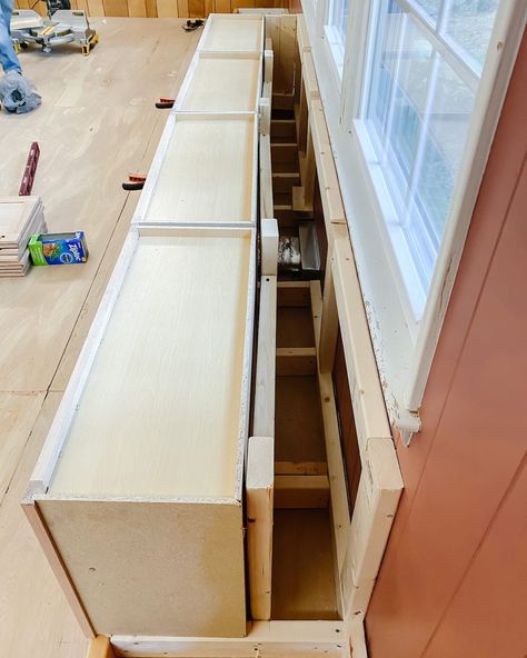 A step-by-step tutorial to build DIY built in cabinets and a window seat using inexpensive stock kitchen cabinets. Wall Cabinet Bench, Window Seats In Kitchen, Stock Kitchen Cabinets Ideas, Diy Built Ins Around Window, How To Build A Window Seat, Window Built Ins With Bench, Dining Room Built Ins Around Window, Window Seat In Kitchen, Diy Window Seat With Storage