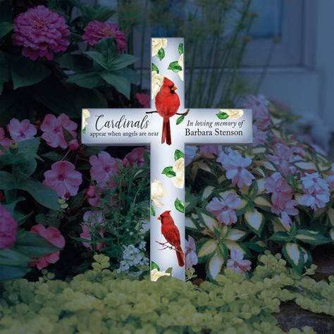 "The solar cardinal garden stake is a beautiful addition to any outdoor space.  During the day, this cardinal memorial garden stake absorbs the sunlight, and at night it glows with a warm and gentle LED light. Made of high-quality polyresin, it is durable and robust, able to withstand various weather conditions. The stake also comes with an integrated solar panel and internal rechargeable battery, ensuring that your cardinal garden stake remains illuminated night after night without any hassle. Dog Grave Marker, Cross Garden, Solar Cross, Rustic Wood Lanterns, Memorial Cross, Cardinal Memorial, Handmade Lanterns, Solar Garden Stakes, Solar Wind Chimes