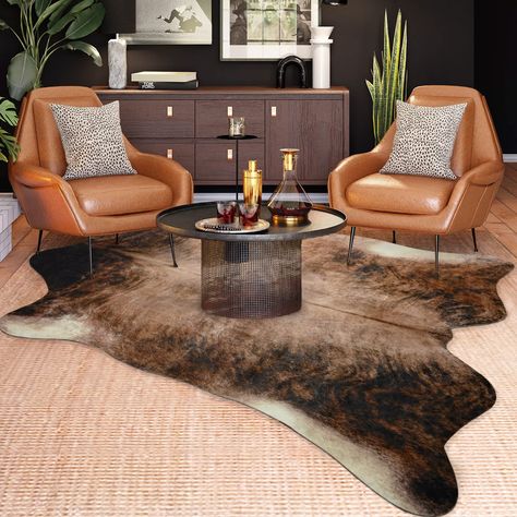 PRICES MAY VARY. ❃【Perfect Home Decor】Artificial cowhide rugs are designed with natural animal patterns and colours, with clear and natural patterns and bright colours; very suitable for beautiful decoration in the dining room, living room, bedroom, studio, home office, dormitory, etc., easily integrated into the home environment, adding some art to life-breath. ❃【Creases Disappear Automatically】The cowhide carpet is made of elastic material and has the function of automatically repairing the cr Cowhide Rug Diningroom, Cow Hide Rug Living Room Apartment, Cowhide Layered Over Rug Office, Brown Leather Sofa Cowhide Rug, Cow Hide Rug Living Room Modern Farmhouse, Cow Hide Rug Dining Room Modern, Cowhide Rug Placement Living Rooms, Layering Cowhide Rug Dining Room, Cowprint Living Room Rug