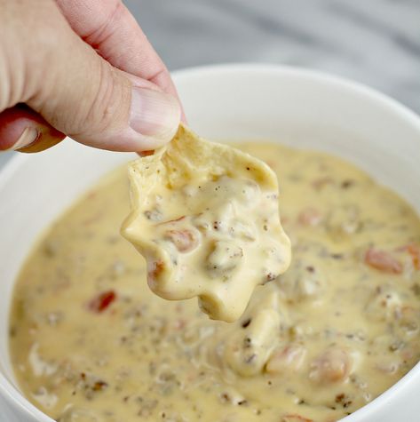 The ultimate crowd-pleasing party dip, my Velveeta Rotel dip recipe has beer, soup, and sausage, that make it THE BEST sausage queso dip. Velveeta Rotel Dip, Dip With Sausage, Velveeta Dip, Rotel Dip With Sausage, Sausage Queso Dip, Velveeta Rotel, Sausage Queso, Velveeta Shells And Cheese, Shells And Cheese