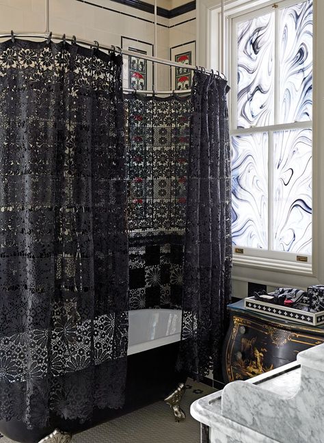 This bathroom's Signature Hardware tub has a lace curtain, adding to the gothic feel of the space. Lace Shower Curtains, Gothic Bathroom, Dark Home Decor, New York City Apartment, Goth Home, Goth Home Decor, Dark Home, Bath Room, Gothic Home Decor