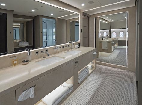 The massive master bathroom features a set of large marble his and hers sinks. Private Plane Interior, Boeing Business Jet, Private Jet Interior, Jet Privé, Luxury Helicopter, His And Hers Sinks, Luxury Jets, Boeing 787 Dreamliner, Luxury Private Jets