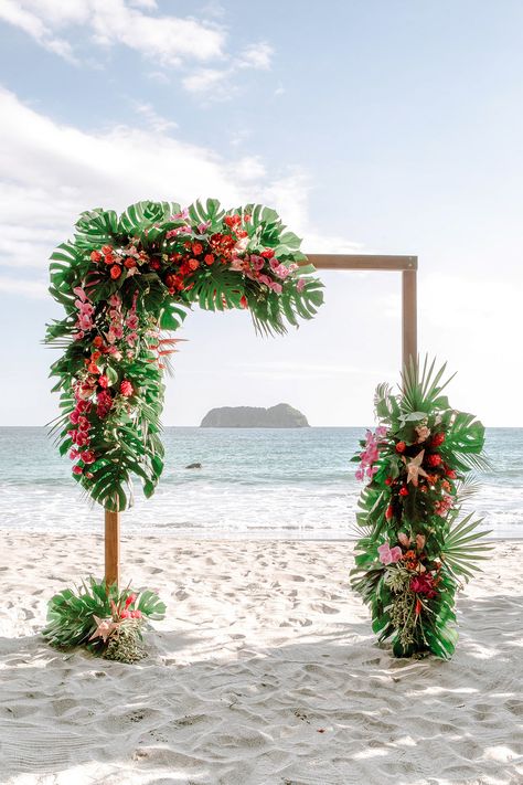 An Intimate Beach Wedding in Costa Rica with a Fuchsia-and-Rose-Gold Color Palette Beach Wedding Flowers Tropical Bridal Bouquets, Tropical Wedding Arbor, Tropical Wedding Arch Ideas, Tropical Wedding Mood Board, Tropical Beach Decor, Tropical Wedding Colors Palette, Tropical Wedding Theme Colors, Tropical Wedding Arch, Tropical Theme Wedding