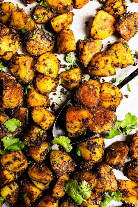 Aromatic and comforting, these Bombay potatoes are bursting with flavor! Parboil potatoes, generously coat them in an easy to make curry oil, then roast them to fragrant, crispy perfection. The potatoes are a hearty and satisfying base to rich and aromatic spices, blending flavor and comfort food into an incredible Indian-inspired side dish. #theendlessmeal #potatoes #bombaypotatoes #roastpotatoes #roastedpotatoes #dinner #sidedish #curry Bombay Potato Recipe, Indian Potato Recipes, Fruit Sides, Self Note, Side Dishes Healthy, Saag Recipe, Bombay Potatoes, Crumble Cookie Recipe, Indian Soup