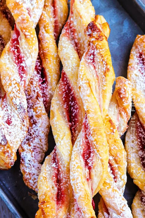 If you're looking for a sweet pastry with the prettiest of presentations, look no further than these raspberry pastry twists Puff Pastry Recipes Dessert Raspberry, Pastry Twist Recipes, Raspberry Pastry Filling, Puff Pastry Dessert Raspberry, Sweet Pastry Recipes Desserts, Puff Pastry Bread Twists, Raspberry Twist Bread, Pepridge Farm Puff Pastry Recipes, Raspberry Turnovers Puff Pastries