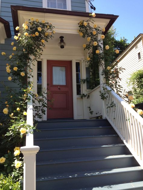 Climbing roses Navy House Exterior, Climbing Roses Trellis, Porch Pillars, Navy Houses, Garage Pergola, Front Stairs, Climbing Flowers, Rose Trellis, Deck Stairs