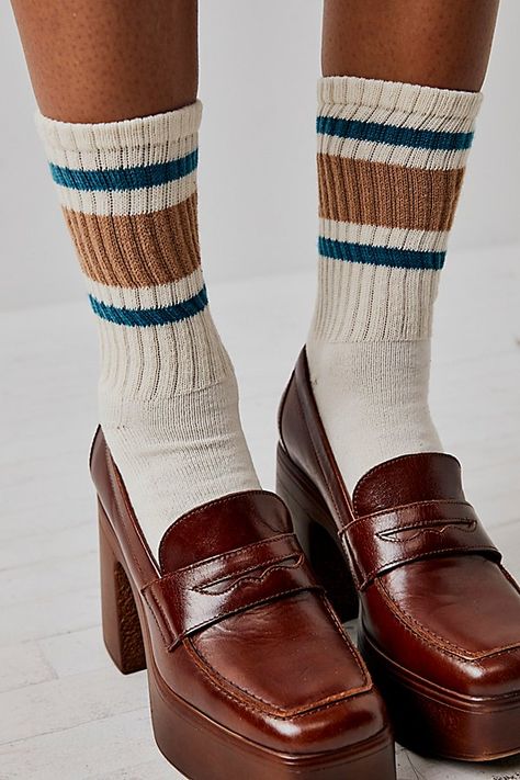 Classic sporty crew socks featured in a wide ribbed design with striped details at the ankle. * Calf-high rise * Comfortable fit | Retro Stripe Tube Socks by FP Movement at Free People, Sky Socks And Heels Street Style, Tube Socks Outfit, Striped Socks Outfit, Women In Paris, Striped Tube Socks, Sneaker Outfits Women, Vintage Socks, Sock Outfits, Shoes Too Big