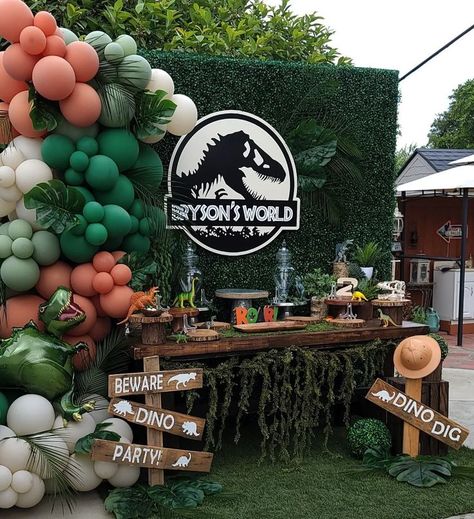 Throw a little dino-mite bash with decor inspired by the movie Jurassic Park! Let these fun ideas help you "build" the perfect party. #LavishMoments #KidsBirthday #Balloons #KidsBirthdayParty #SmallBusiness #BalloonArch #BalloonGarland #ToddlerParty #EventPlanning #BalloonDecor #BalloonStylist #ModernBalloons #LuxeBalloons #BirthdayBalloons #BalloonInspo #JurassicPark #JurassicWorld #JurassicWorldParty #JurassicParkParty #Dinosaur #DinosaurParty #JurassicParkBirthday #ParqueJurasico Jurassic Park Balloon Decor, Jurassic Park Party Balloons, Jurassic Park Outdoor Decorations, Jurassic Park Photoshoot, Jurassic World Balloon Garland, Dino Party Balloons, Jurassic Theme Party, Jurassic Park Balloons, Jurassic Park Balloon Arch