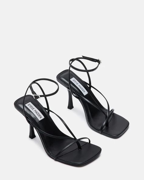 Perfect for dressing up or down, ANNIE has so much going for her. A simple strappy silhouette and sexy stiletto heel work in tandem to complement all your work to play looks. 3.75 inch heel height Vegan leather upper material Vegan leather lining Vegan leather sock Synthetic sole Imported #AD Branded Shoes For Men, Steve Madden Store, Steve Madden Heels, Black Strappy Heels, Square Toe Heels, Leather Socks, Fall Shoes, Madden Girl, Trendy Shoes