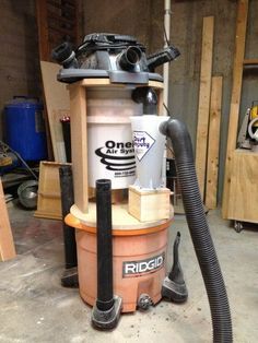 improved dust deputy... I can use that! Dust Collector Diy, Dust Deputy, Patio Chairs Diy, Shop Dust Collection, Dust Collection System, Woodworking Tools Workshop, Shop Vacuum, Garage Makeover, Shop Vac