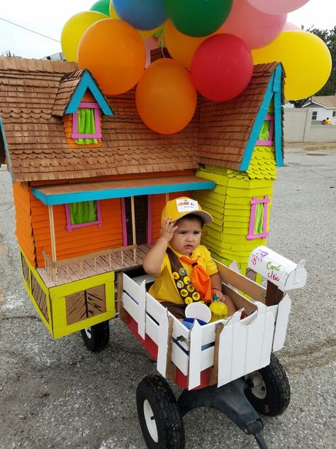 Finding Nemo Wagon Costume, Rocket Wagon Halloween, Wagon Tractor Costume, Train Halloween Costume Toddler, Kids Wagon Float Ideas, Wagon Costumes For Kids, Diy Wagon Costume, Diy Halloween Wagon Ideas, Halloween Stroller Decoration