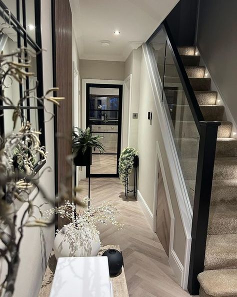 Upstairs Hallway Window Ideas, Hallway Ideas Glass Stairs, Glass Doors Hallway, Black Doors On Landing, Modern Home Hallway, Cream Herringbone Floor, Hallway Ideas With Stairs, Hallway Inspo Entrance, Black And Glass Staircase