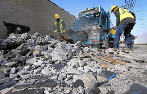 One week ago, Lauri Jutila walked out the back of his Mid-City apartment building and found a sprawling heap of construction waste in the alley: floor tile, trash bags, wood planks and other construction debris stretching more than 100 feet. Construction Waste, Oil Spill, Pet Peeves, City Apartment, Trash Bags, Walk Out, Wood Planks, Floor Tile, Apartment Building