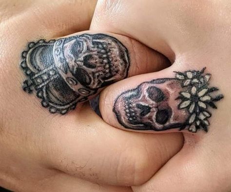 Matching Viking Couple Tattoos, Matching Goth Tattoos Couples, Couples Skull Tattoos, Matching Skull Tattoos For Couples, Finger Skull Tattoo, Traditional Matching Tattoos, Matching Wedding Tattoos, Skull Finger Tattoos, Skeleton Couple Tattoo